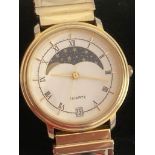 Gentlemans Quartz MOONPHASE Wristwatch in gold tone, having golden digits and hands with matching