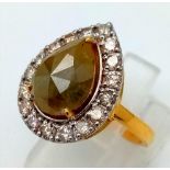 A 14K Gold 4ct Pear-Cut Yellow Diamond Ring - with a 0.77ct diamond accent surround. Size M. 3.56g