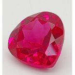 A high quality, large (55 carats), pear cut, ruby. Excellent colour saturation and uniform