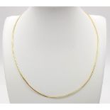 An 18K Yellow Gold Italian Snake-Skin-Link Necklace. 46cm. 5.5g total weight.
