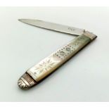 A Georgian silver and mother of pearl folding fruit knife with integrated match striker. Carries
