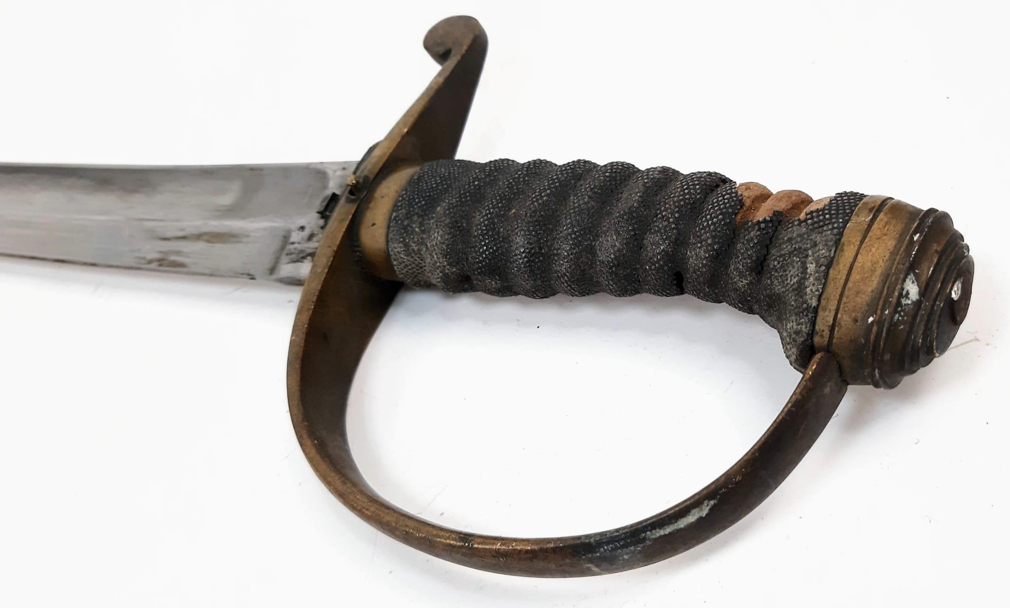 An Antique Military Curved Sabre Sword with Scabbard. Brass hilt. Hard leather and brass scabbard. - Image 4 of 7