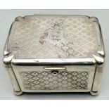 An Antique Polish White Metal Lidded Box. Engine turned geometric decoration. 12 x 9cm.