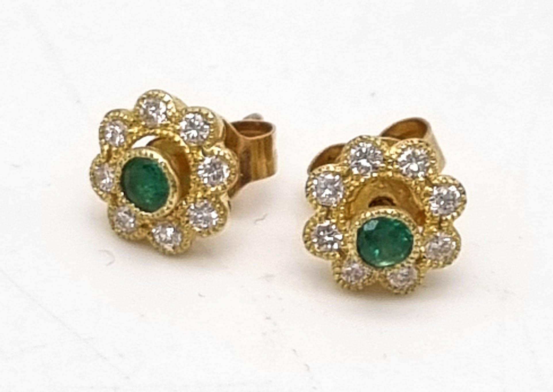 18K WHITE GOLD DIAMOND AND EMERALD CLUSTER STUD EARRINGS. CAN ALSO BE MADE INTO EMERALD STUDS.