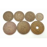 A group of seven old coins.