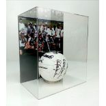 A FOOTBALL SIGNED BY THE TOTTENHAM HOTSPUR 1981 FA CUP WINNING TEAM NICELY DISPLAYED IN A PERSPEX