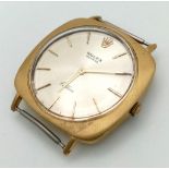 An 18 K brushed yellow gold ROLEX CELLINI, 30 x 30 mm case with champagne coloured dial. Manual