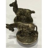 A European antique white metal pair of novelty animal bottle stoppers. Height of donkey 2.8cm Length