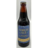 A 1977 Bottle of Jubilee Ale - Brewed by Greene King and Sons Ltd. 20cm tall.