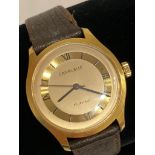 Gentlemans vintage 1950/60’s CARAVELLE wristwatch in gold tone having black digits and hands.