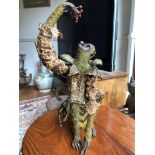 A extremely rare 19th century and early antique papier-mâché siting monkey possibly from a