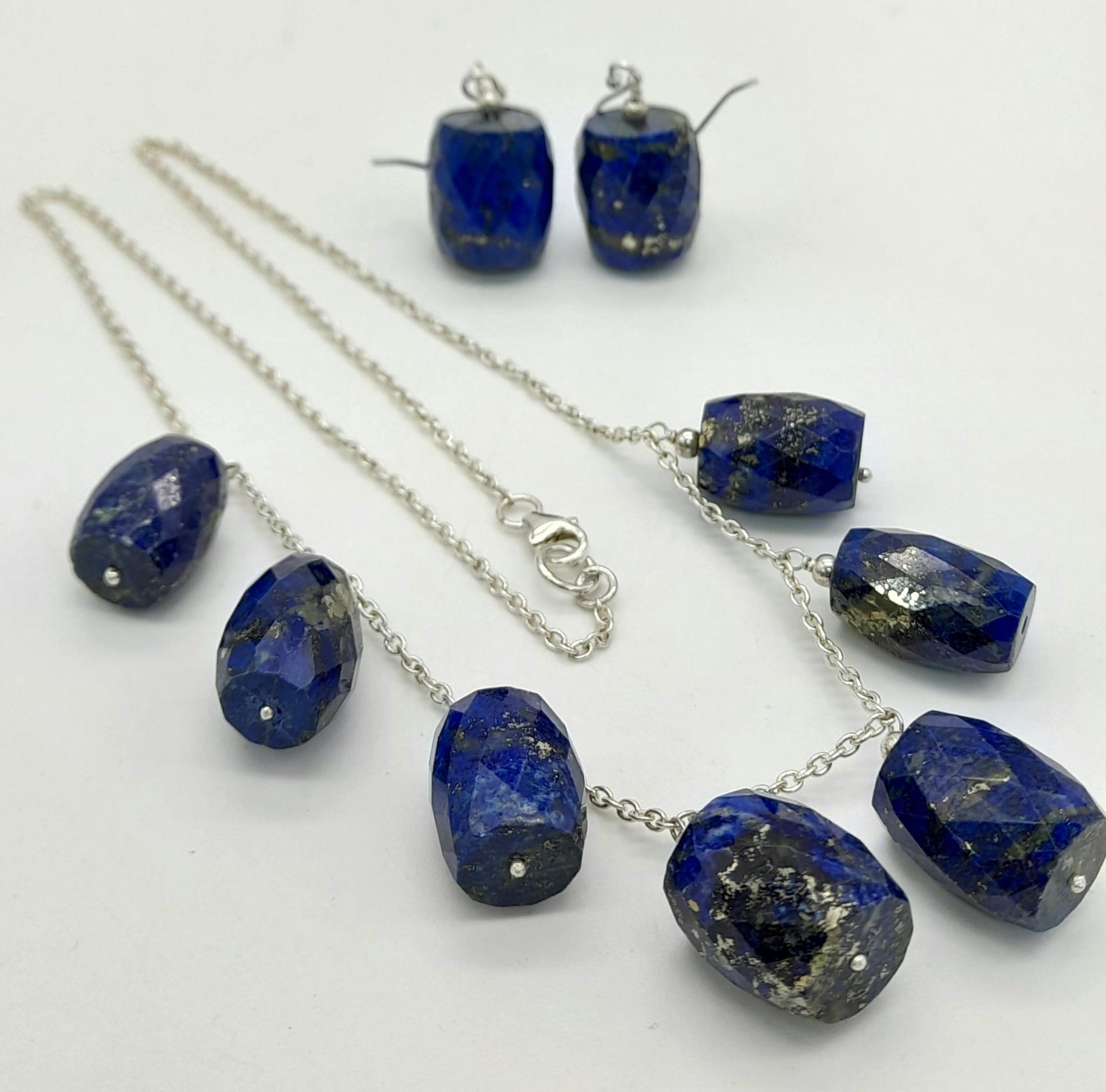 A 220ct Lapis Lazuli Necklace with a Matching Pair of Barrel Earrings set in 925 Silver. 42cm -