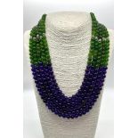 A 1000ct Jade and Amethyst Five-Strand Statement Necklace. 8mm beads. 44-52cm.