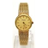 A 14K Solid Gold Bouchard Ladies Watch. Solid gold strap and case - 20mm. Quartz movement. In very