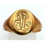 An 18K Yellow Gold Signet Ring with Inscription. Size R. 4.41g