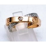 A CARTIER ROSE GOLD AND DIAMOND FACTORY SET RING 6.6gms size N