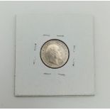 A 1902 Uncirculated Silver Maundy 4 Pence Coin. In a protective wallet.