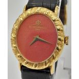 An 18K yellow gold BAUME & MERCIER ladies watch with original crocodile leather strap. 24 x 22 mm