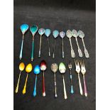 A large silver and enamel group of Russian and European spoons and forks . Enamel is in superb