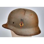 WW2 German Battle Damaged M35 Hitler Youth Helmet.