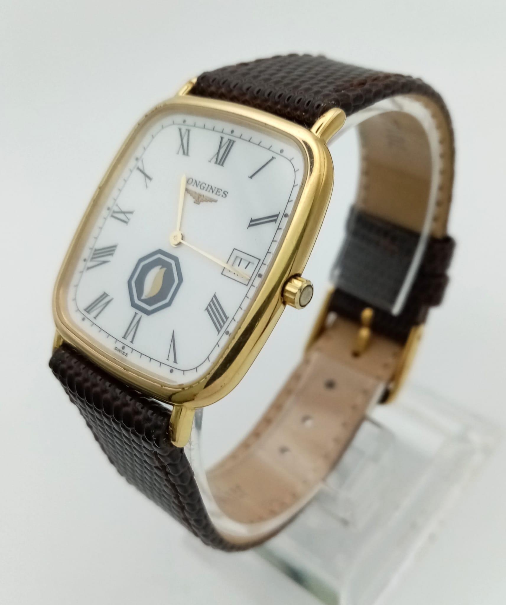 A Vintage Longines Gents Watch. Brown leather strap. Case - 30 x 30mm. White dial with date - Image 2 of 4