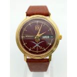 A RARE CANDID 3000S MANUAL WIND WRIST WATCH WITH RED DIAL AND LEATHER STRAP. 32mm