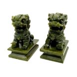 A Pair of Miniature Jade Foo Dog Figures. 6.5cm tall.