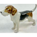 A Ceramic Beagle Dog Figurine. Marking on leg - 9504I. 14cm tall