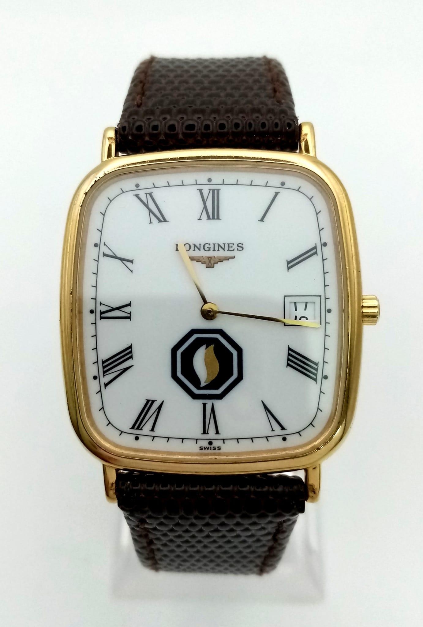 A Vintage Longines Gents Watch. Brown leather strap. Case - 30 x 30mm. White dial with date