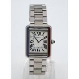 A Cartier Ladies Quartz Movement Tank Watch. Stainless steel strap and case - 25 x 32mm. White dial.
