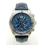 A BREITLING AUTOMATIC CHRONOMETER WITH DATE BOX AND 3 SUBDIALS AND UNUSUAL BLUE DIAL, COMES IN