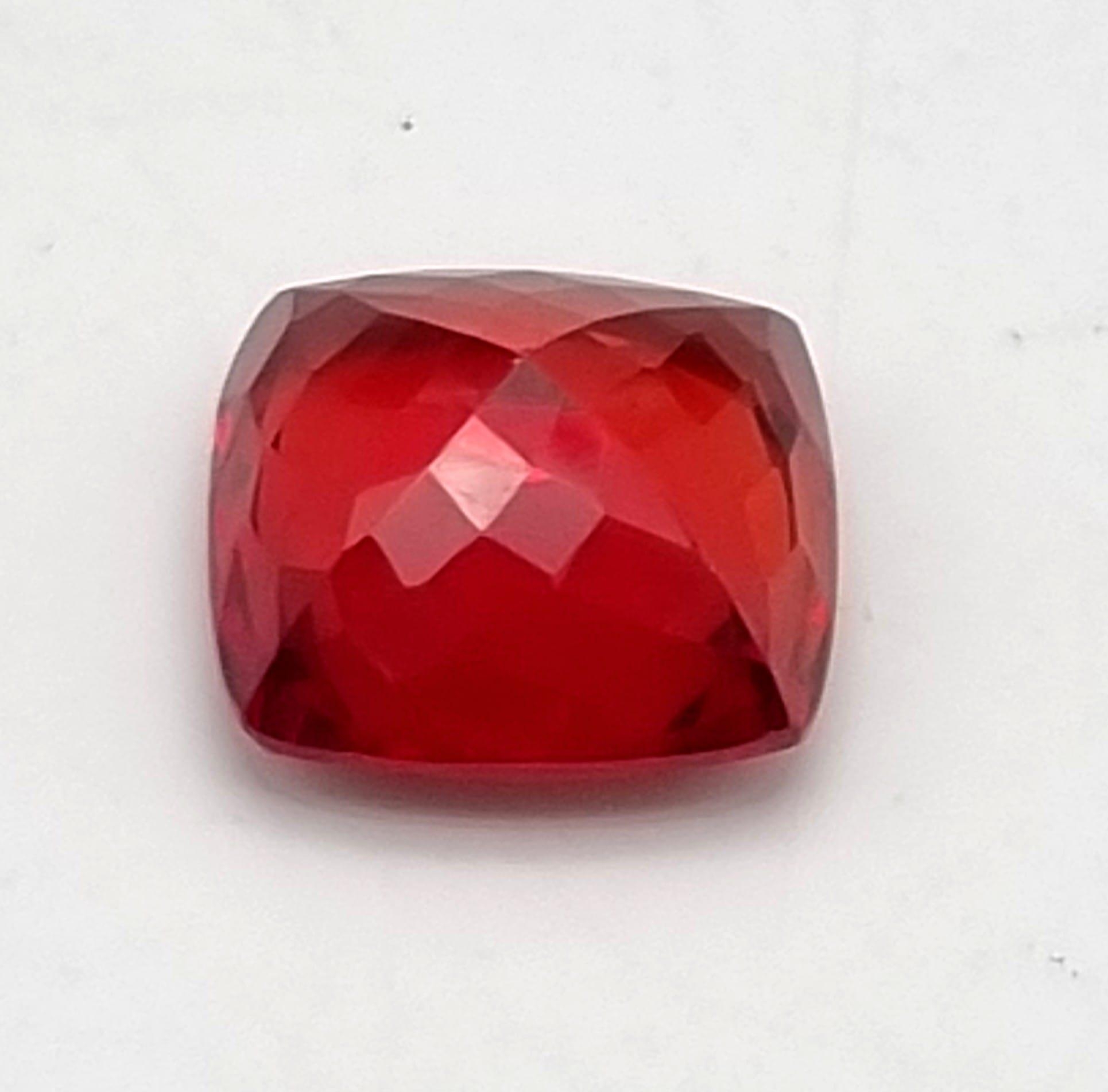 A 35ct Well Faceted Blood-Orange Coloured Cushion-Cut Gemstone. 19 x 19mm. No certificate so as - Image 3 of 3