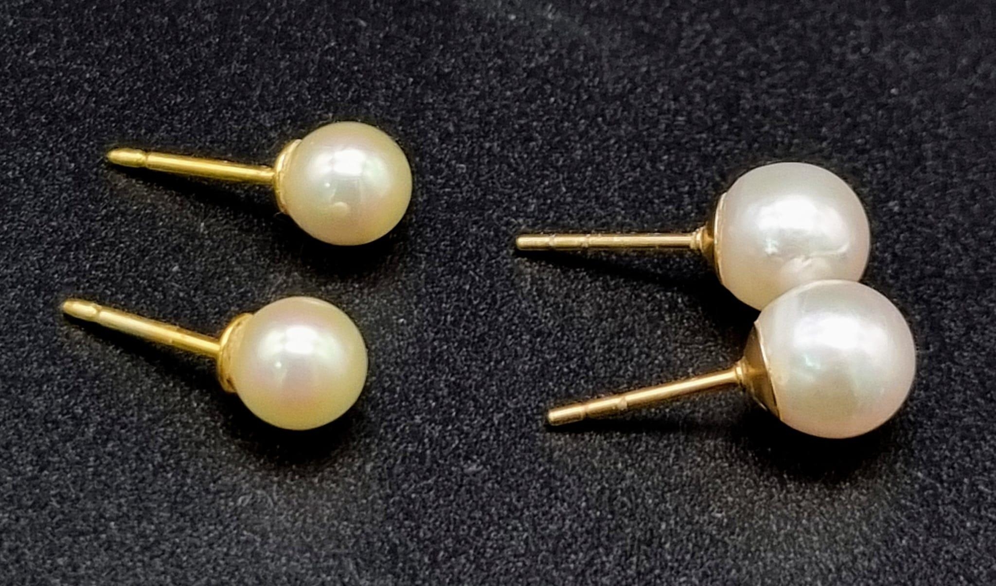 Two Pairs of 9K Yellow Gold Pearl Earrings - without fasteners. 2.76g total weight.