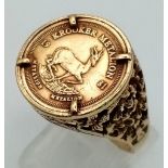A 9K Gold Krooker Metalion Coin Ring. Size W 1/2. 6.17g. Ref: 1334.
