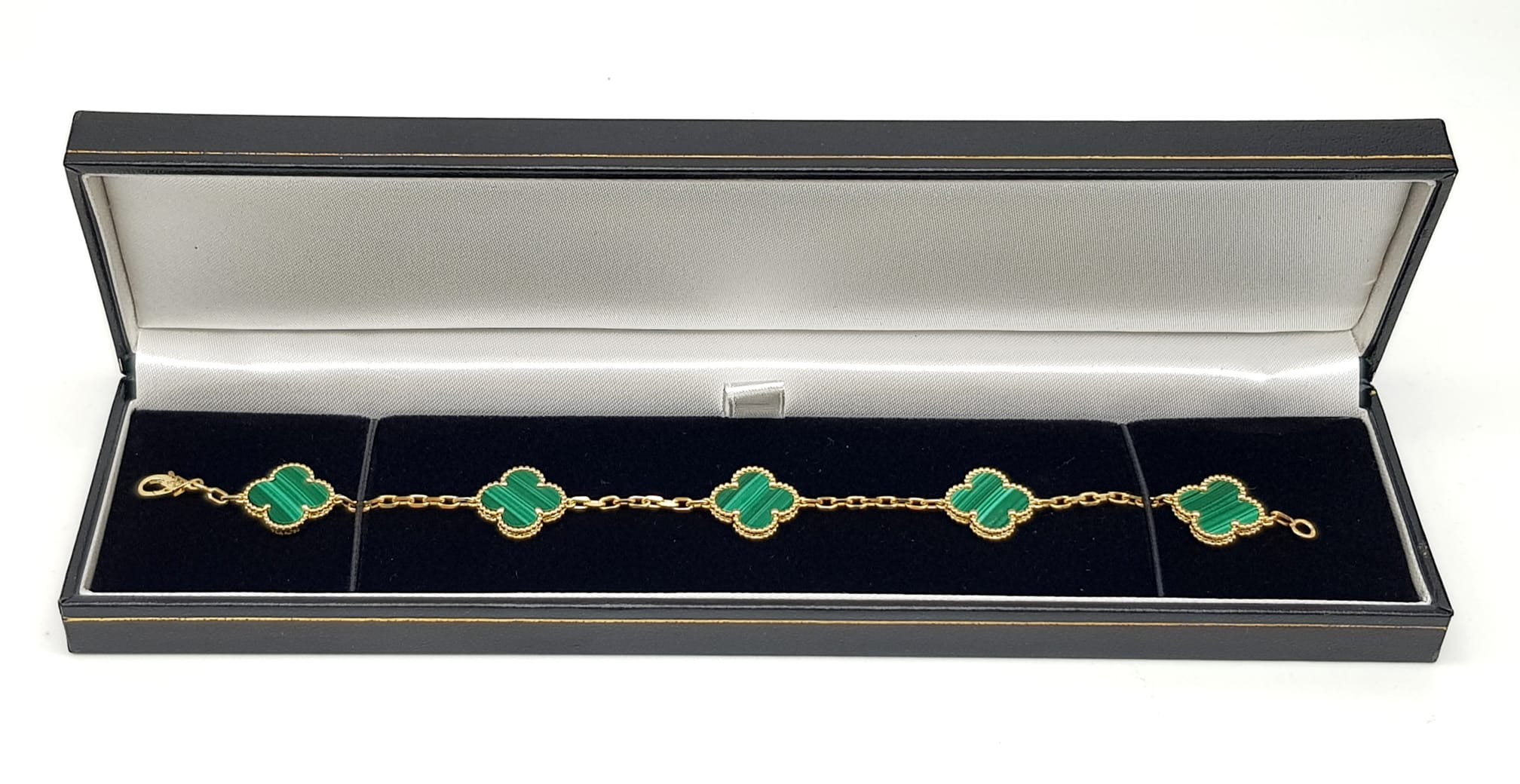 A Van Cleef and Arpels Alhambra bracelet with 5 motifs - 18ct yellow gold with malachite inserts. - Image 4 of 7