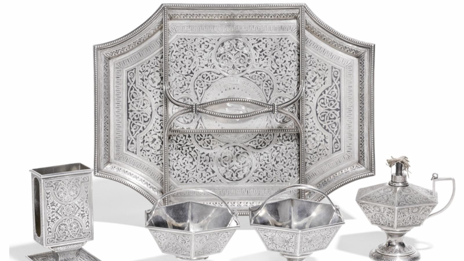 A SILVER AND NIELLO SMOKING SET, ANTIP KUZMICHEV, MOSCOW, 1899-1908 Description A SILVER AND