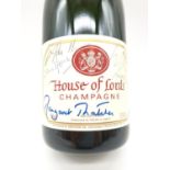 A Margaret Thatcher signed bottle of House of Lords Champagne. Also signed by Prime Ministers,