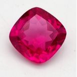 A very desirable, large (67.67 carats), fuchsia red RUBY. Cushion cut, with perfect, uniform,