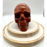 A 1.1 Kilo Natural Hand-Crafted Red Jasper Skull. A wonderful addition to your cabinet of