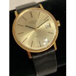 Gentlemans ROTARY Quartz Wristwatch in Gold Tone having date window and sweeping second hand.