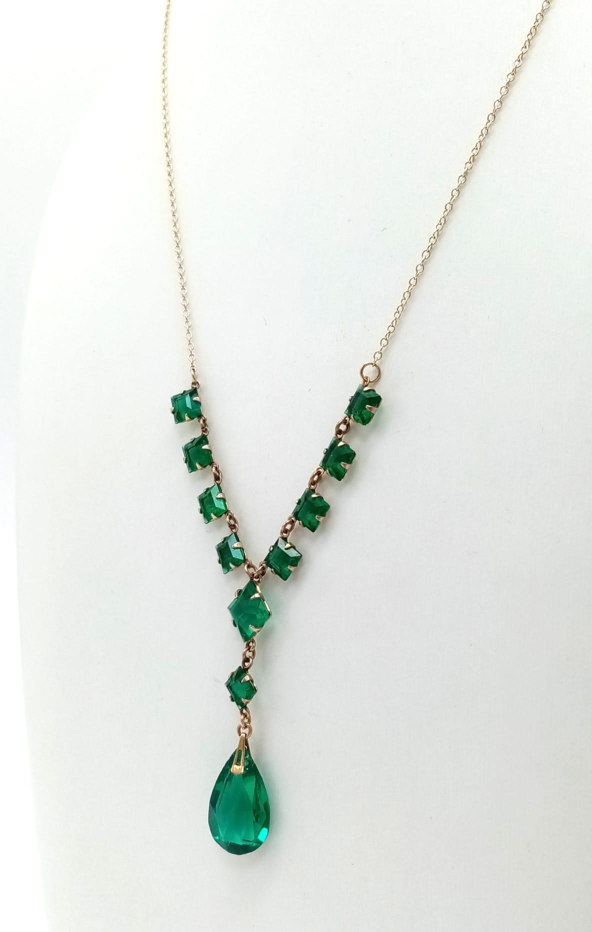 An Art Deco Era Green Stone Ensemble on a 9K Yellow Gold Disappearing Necklace. 44cm. 4.75g total