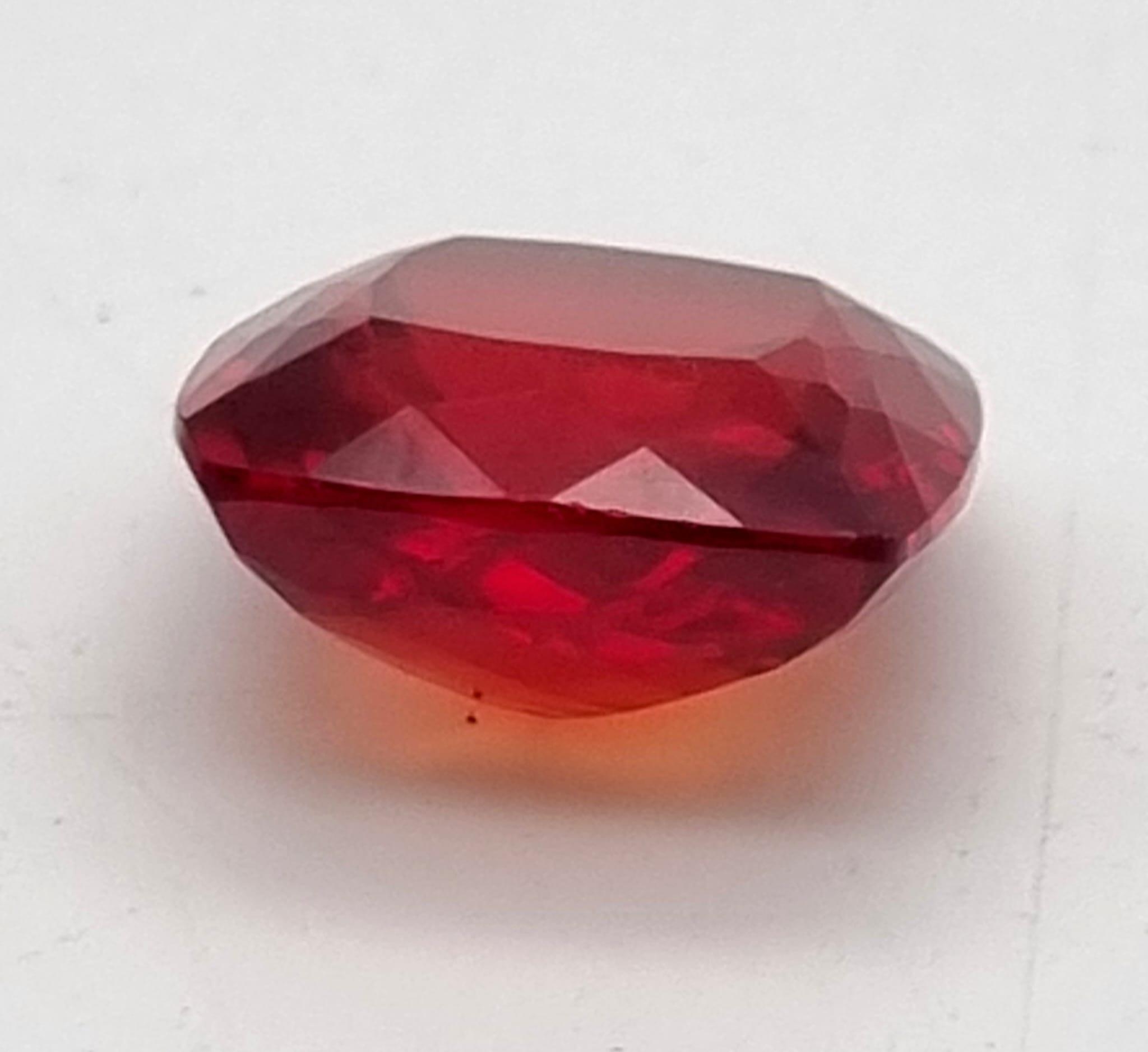 A 35ct Well Faceted Blood-Orange Coloured Cushion-Cut Gemstone. 19 x 19mm. No certificate so as - Image 2 of 3