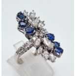 A 14K White Gold Sapphire and Diamond Ladies Ring. The perfect blend of diamond and sapphires in a