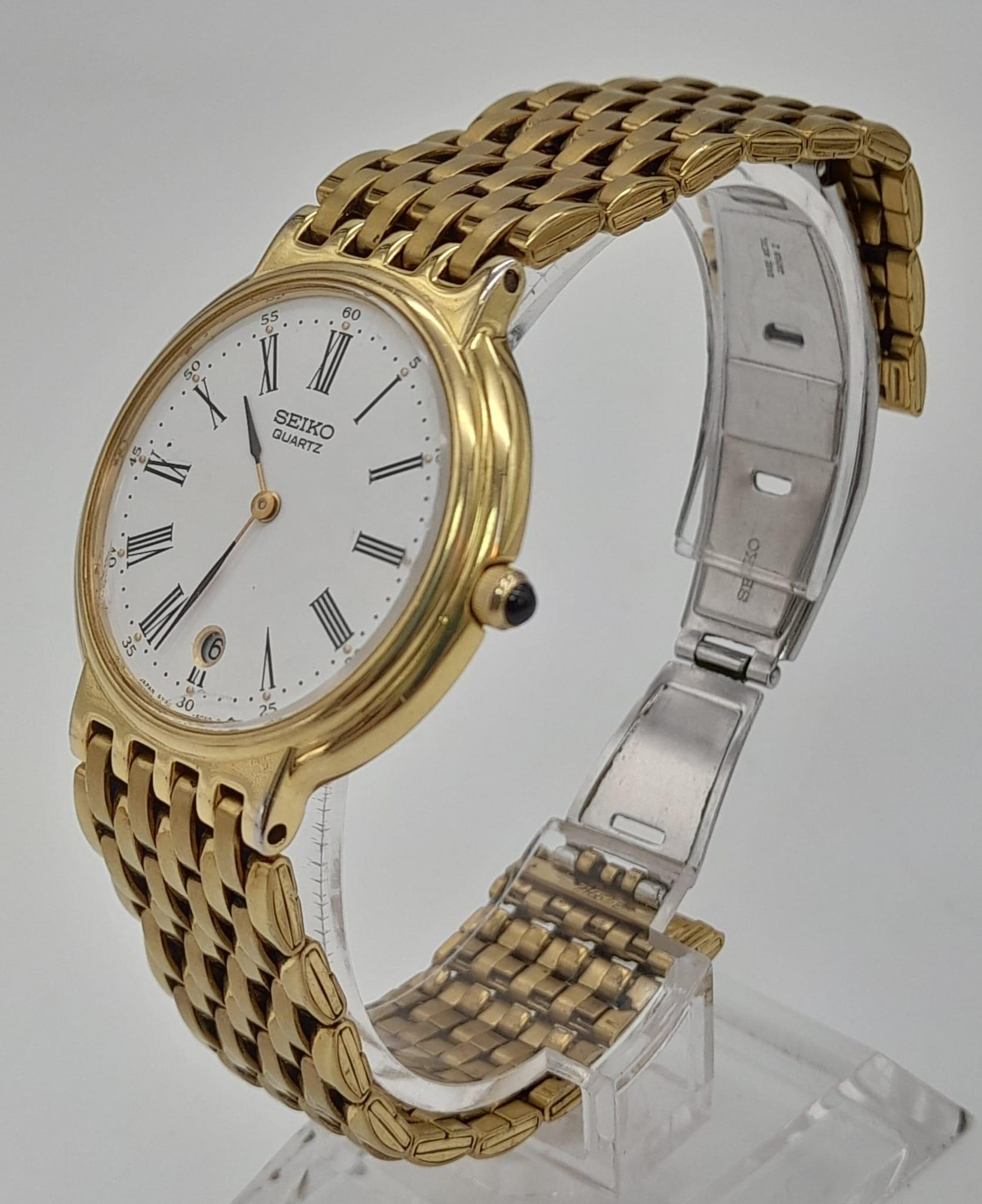 A Gilded Seiko Quartz Ladies Watch. Case -34mm. White dial with date window. In good condition and - Image 2 of 5