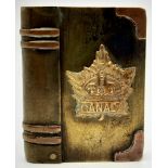 A WW1 Canadian Trench Art Lighter. Made from scrap shell brass.