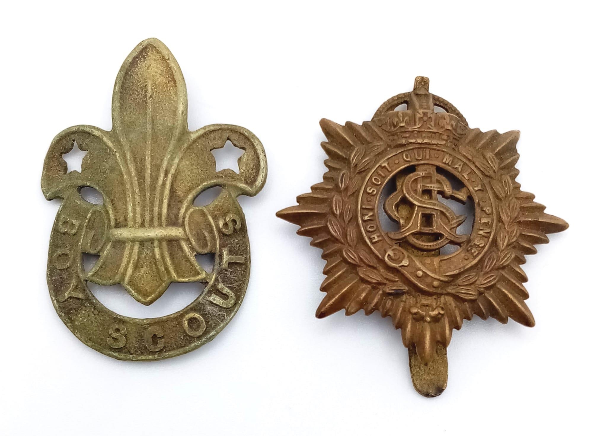A WW1 Army Service Corps and Boy Scout Badge. Boy scout badge missing pin.