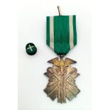 A Japanese Order of The Golden Kite 6th Class Medal with Ribbon. Comes in the original