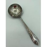 Antique heavy gauge SILVER SIFTING SPOON having clear Hallmark for The Goldsmiths and Silversmiths