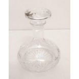A tastefully decorated cut glass decanter-possibly Wedgewood, 22cm tall