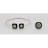 A Designer 2 Cushion Shape Moissanite Open Bracelet, with 2ct of white moissanites set in black